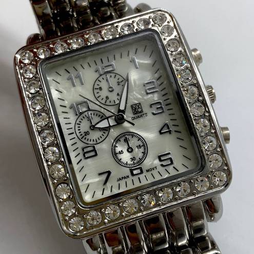 Krass&co NY &  ladies 30mm silver tone rhinestones MOP dial watch sz 7.5” runs