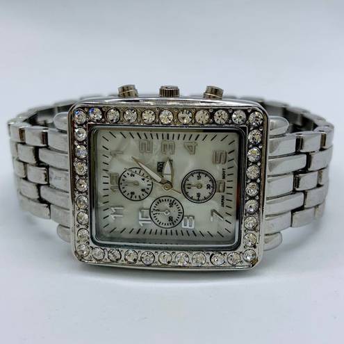 Krass&co NY &  ladies 30mm silver tone rhinestones MOP dial watch sz 7.5” runs