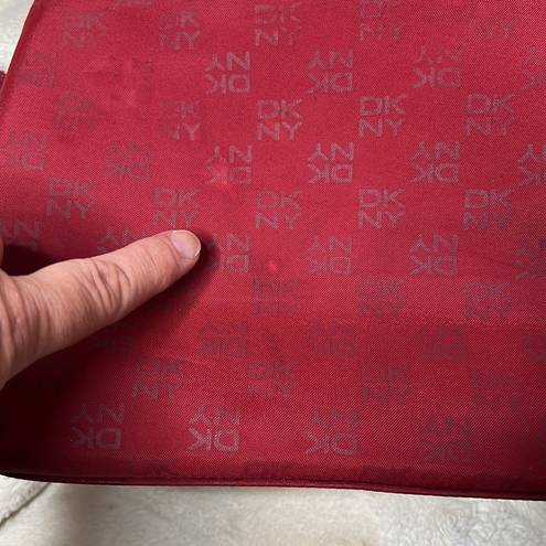 DKNY  red monogram purse. Shoulder bag. Some cracking on inside of strap