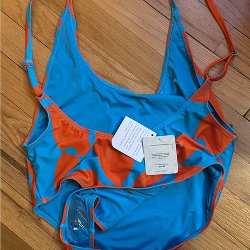 Fabletics  new blue and orange cheeky bathing suit size large