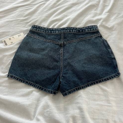 Urban Outfitters denim skort Size 26 Condition: NWT  Color: Blue   Details : - Button down front  - Hidden button and zipper closure  - Comfy  Extras: -  I ship between 1-2 days 