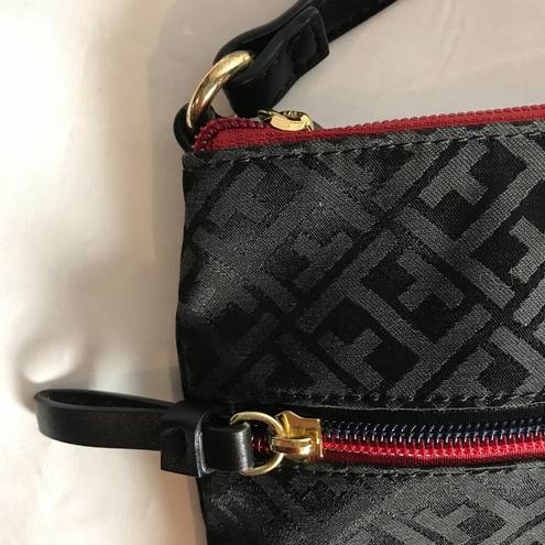 Tommy Hilfiger  Crossbody purse bag in black w/ red accents.  Excellent Condition