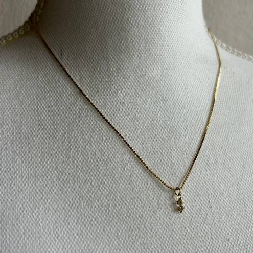 Dainty faceted rhinestones gold tone necklace