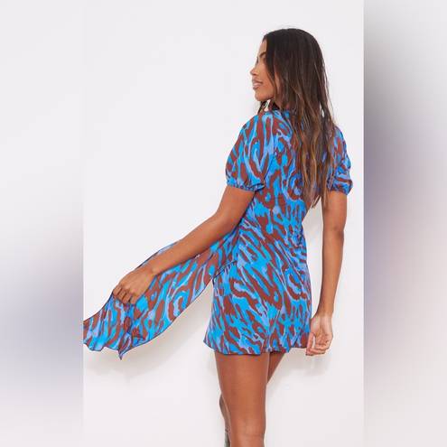 Pretty Little Thing Blue Leopard Print Wrap Drape Shift Dress. Size 2. NWT