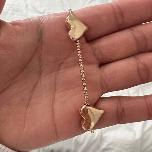 Urban Outfitters heart bracelet   One Size  Condition: NWT Color: gold