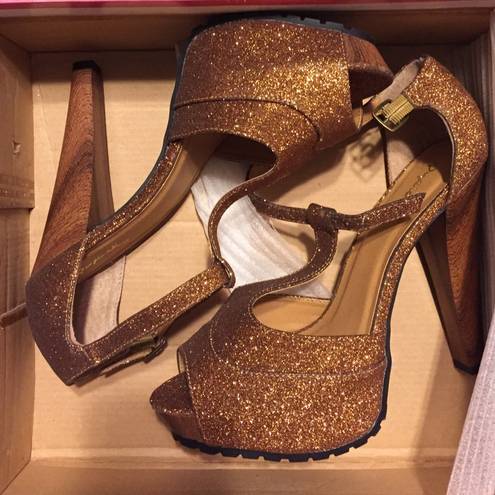 Bebe Bronze sparkle Cupid pumps