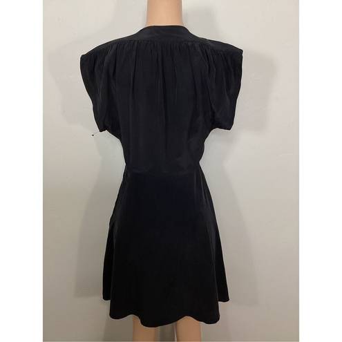 Equipment New.  black silk fit and flair dress. Small. Retails $398