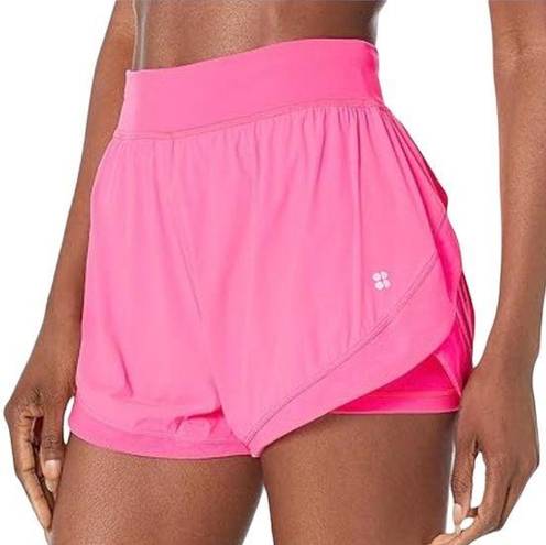 Sweaty Betty  Neon/ sonic pink athletic shorts.  Size small