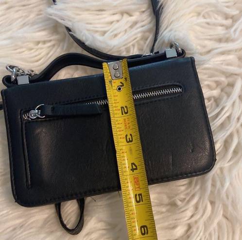 Madison West  Purse / wristband color black see all measurements and photos