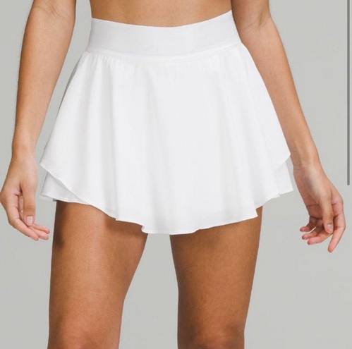 Lululemon  white court rival skirt built in shorts pockets skort size 4