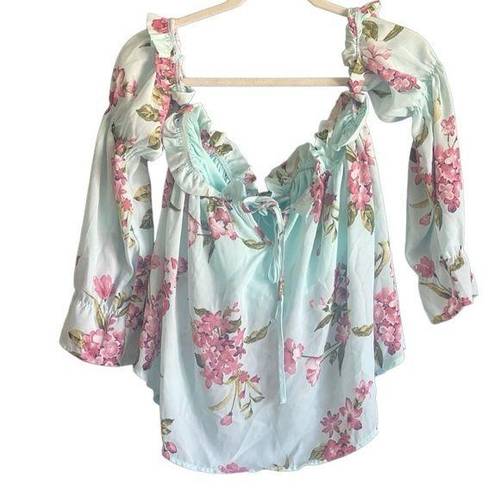 Peach Love California NWT Peach Love Blue Floral Cold Shoulder Cropped Blouse. Size Small.