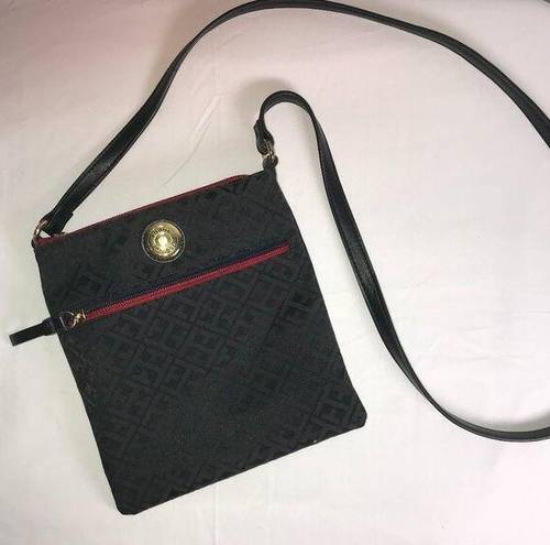 Tommy Hilfiger  Crossbody purse bag in black w/ red accents.  Excellent Condition