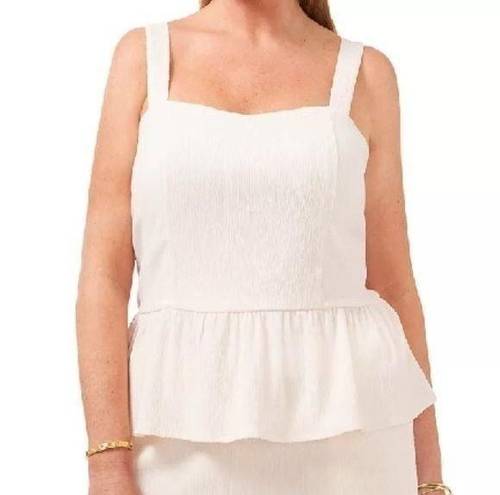 1. State Plus Size Knit Peplum Top​​​​​​​​​​​​​​​​​​