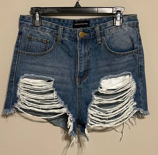 Pretty Little Thing  JEANIE MID WASH EXTREME RIPPED DENIM SHORTS