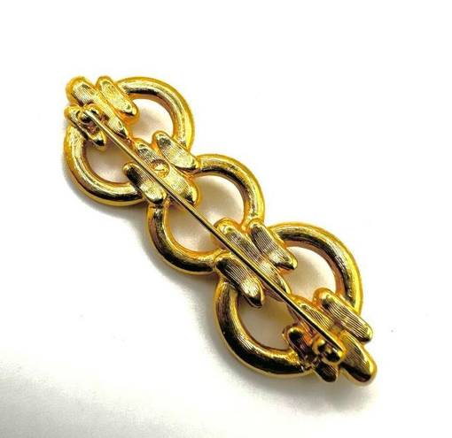 Swavorski Vintage Swarovski swan circle bar gold tone brooch