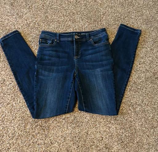 Macy's Women’s Dark Blue Non ripped skinny jeans.