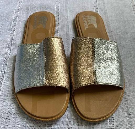 Sorel  two toned metallic slip on sandals.