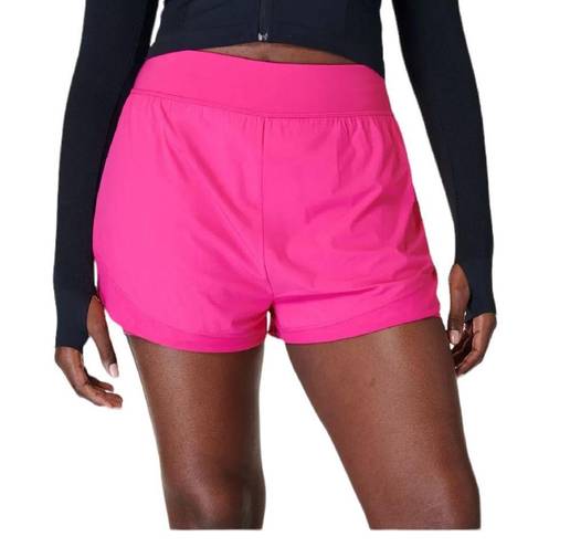 Sweaty Betty  Neon/ sonic pink athletic shorts.  Size small