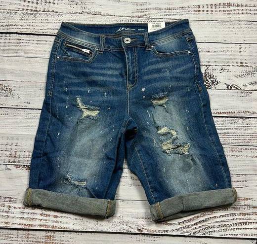 INC  distressed mid rise jeans size 8