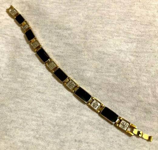 Unique Vintage  gold-tone bracelet with black and silver design