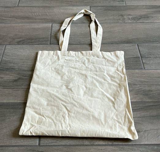 The Bar High vibe facial massages glow canvas tote