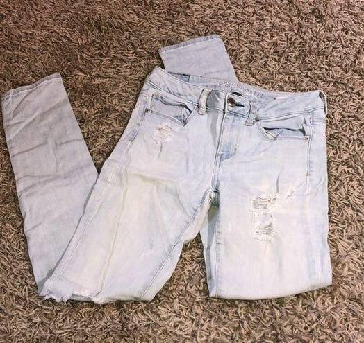 American Eagle  distressed skinny jeans size 4 light wash color holy jeans​​