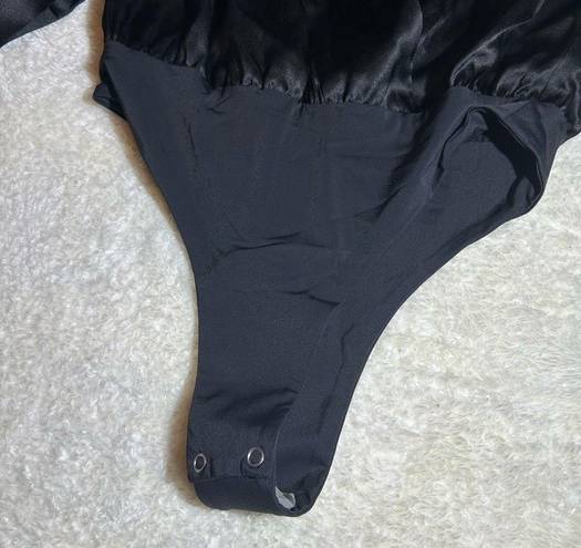 Michelle Mason NWT  Black 100% Silk Long Sleeve Bodysuit ( 0 )