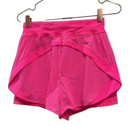 Sweaty Betty  Neon/ sonic pink athletic shorts.  Size small