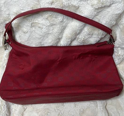 DKNY  red monogram purse. Shoulder bag. Some cracking on inside of strap