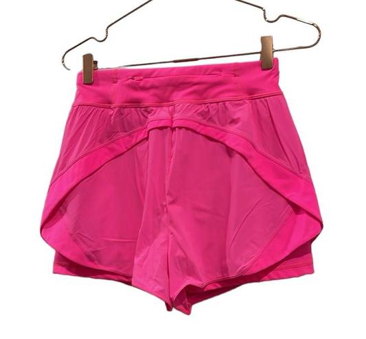 Sweaty Betty  Neon/ sonic pink athletic shorts.  Size small