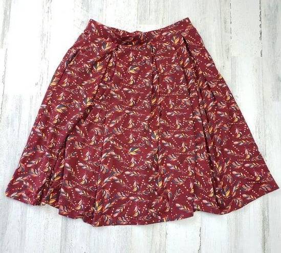 LuLaRoe  Pleated A-Line Red Feather Print Mini Skirt Women's Size Medium