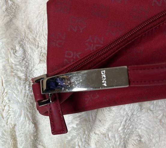 DKNY  red monogram purse. Shoulder bag. Some cracking on inside of strap