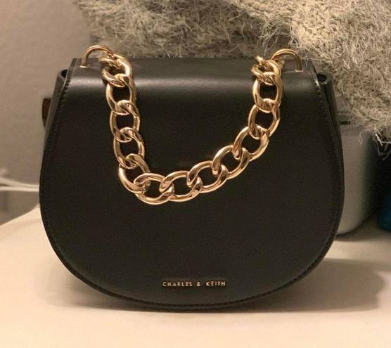 Charles and Keith Charles Keith Black Saddle Bag With Gold Chain Detail