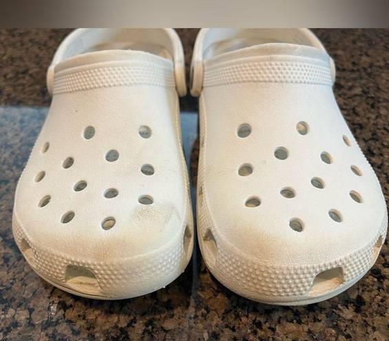 Crocs White . Gently used. Small scuffs in pictures.