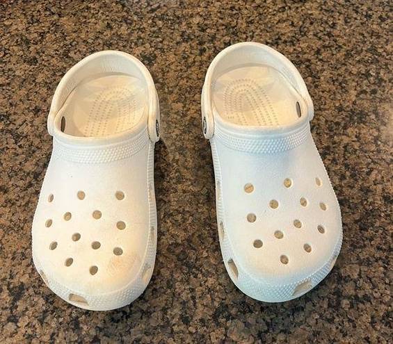 Crocs White . Gently used. Small scuffs in pictures.