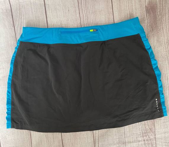 The North Face women L golf/tennis skort grey & blue