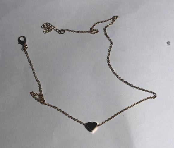 Gold heart charm necklace