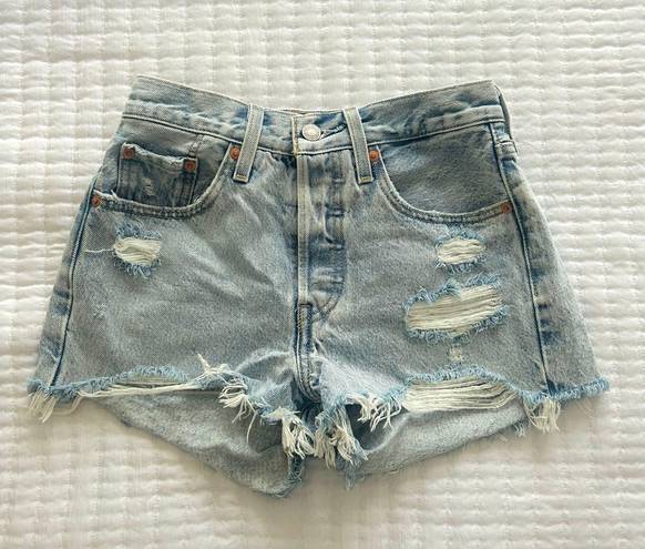 Levi’s 501 distressed denim shorts size 24