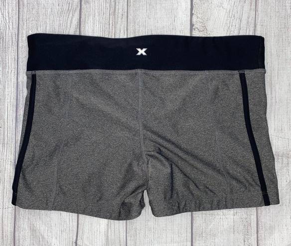 Xersion fitted athletic shorts with no slip hem, black and grey women size Large