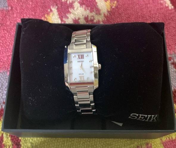 Seiko New!  Women's Solar Dress Watch #SUP377 Silver Diamond & Mother of Pearl