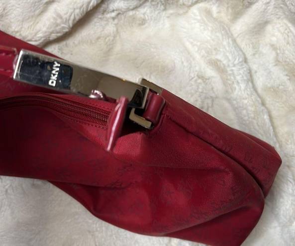 DKNY  red monogram purse. Shoulder bag. Some cracking on inside of strap