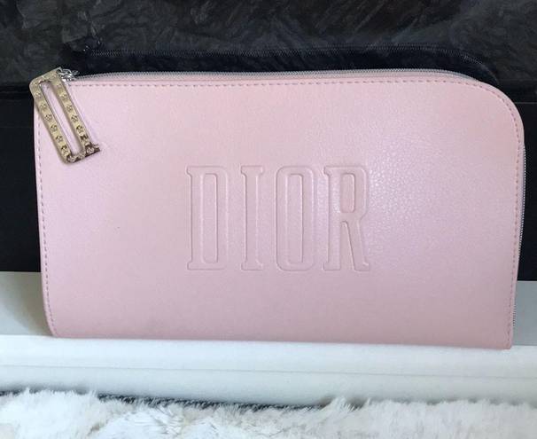 Dior Make up bag in light pink, zipper pull has the D logo