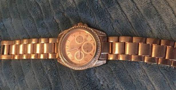 Krass&co NY &  rose gold watch with rhinestones face