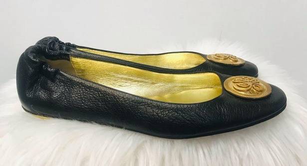 Juicy Couture  black flats with gold symbol sz 9.5