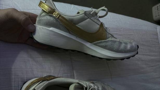 Nike white and gold  debuts