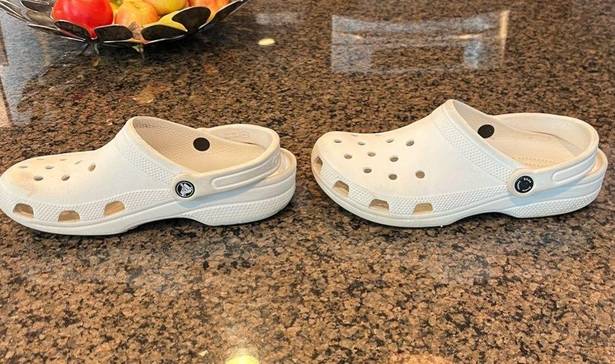 Crocs White . Gently used. Small scuffs in pictures.