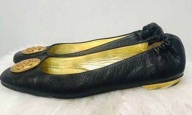 Juicy Couture  black flats with gold symbol sz 9.5