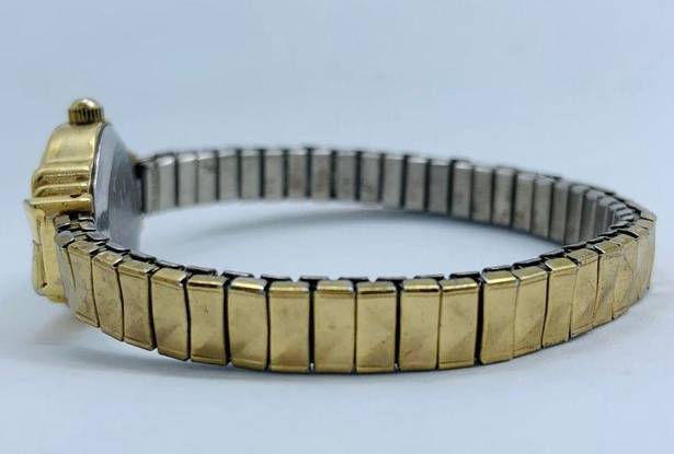 Ladies gold tone Quartz watch 19mm, stretch band size 7” fresh battery