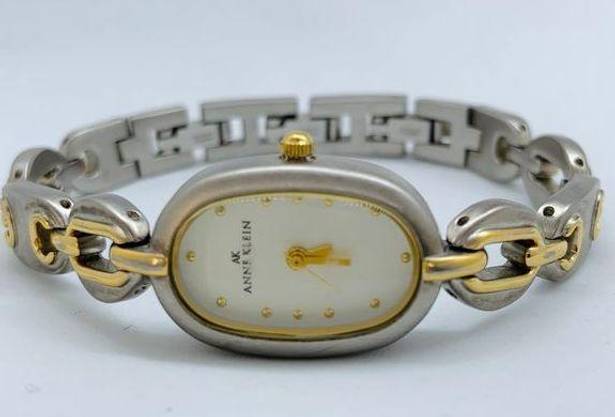 Anne Klein  ladies silver gold tone Quartz analog watch  up to 7.5” runs