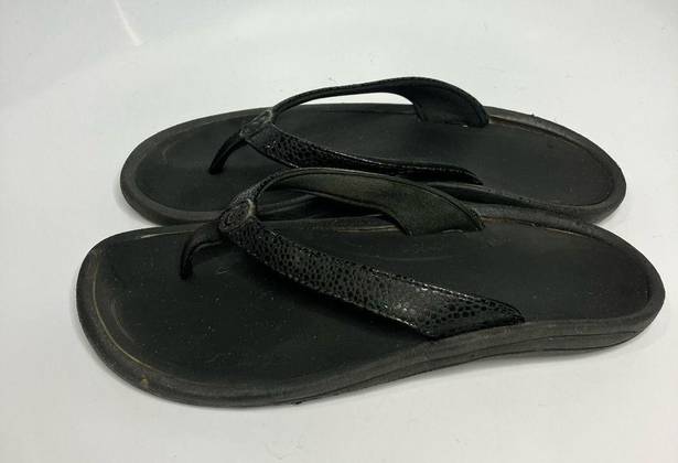 Olukai  black flip flops women’s size 7